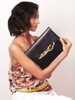 studio metallurgy coral clutch leather